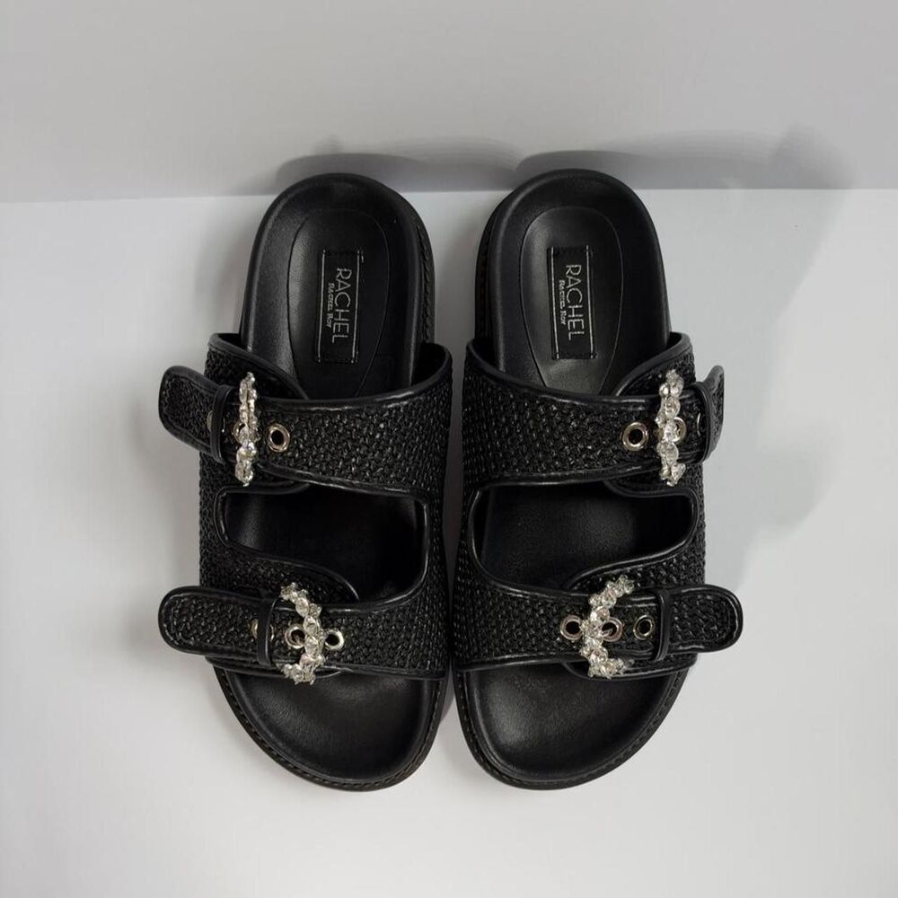 Black raffia slide sandals with rhinestone buckles.